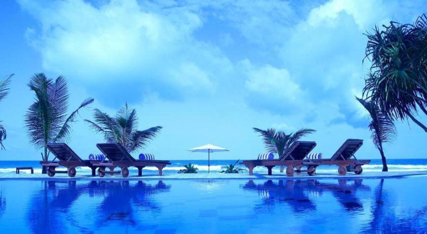 วิสเปอริ่ง ปาล์ม โฮเต็ล Hotel เบนโตตา ภายนอก รูปภาพ