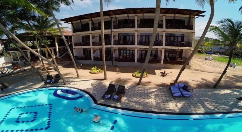 วิสเปอริ่ง ปาล์ม โฮเต็ล Hotel เบนโตตา ภายนอก รูปภาพ