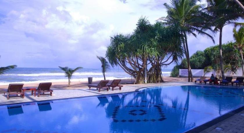 วิสเปอริ่ง ปาล์ม โฮเต็ล Hotel เบนโตตา ภายนอก รูปภาพ