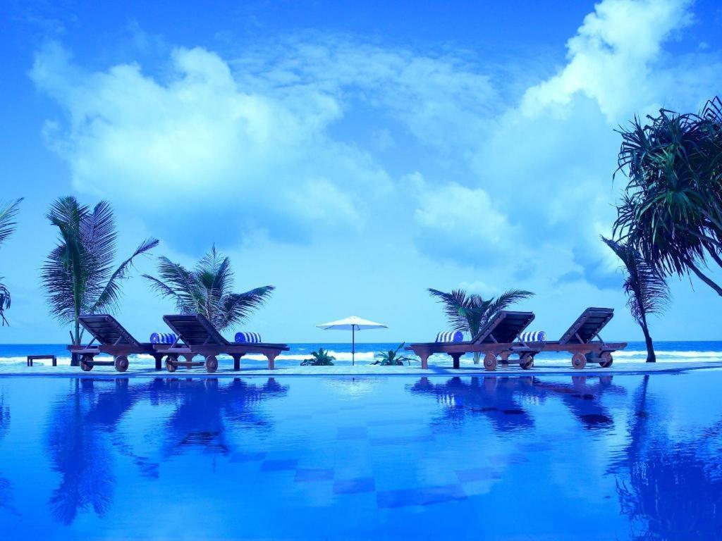 วิสเปอริ่ง ปาล์ม โฮเต็ล Hotel เบนโตตา ภายนอก รูปภาพ