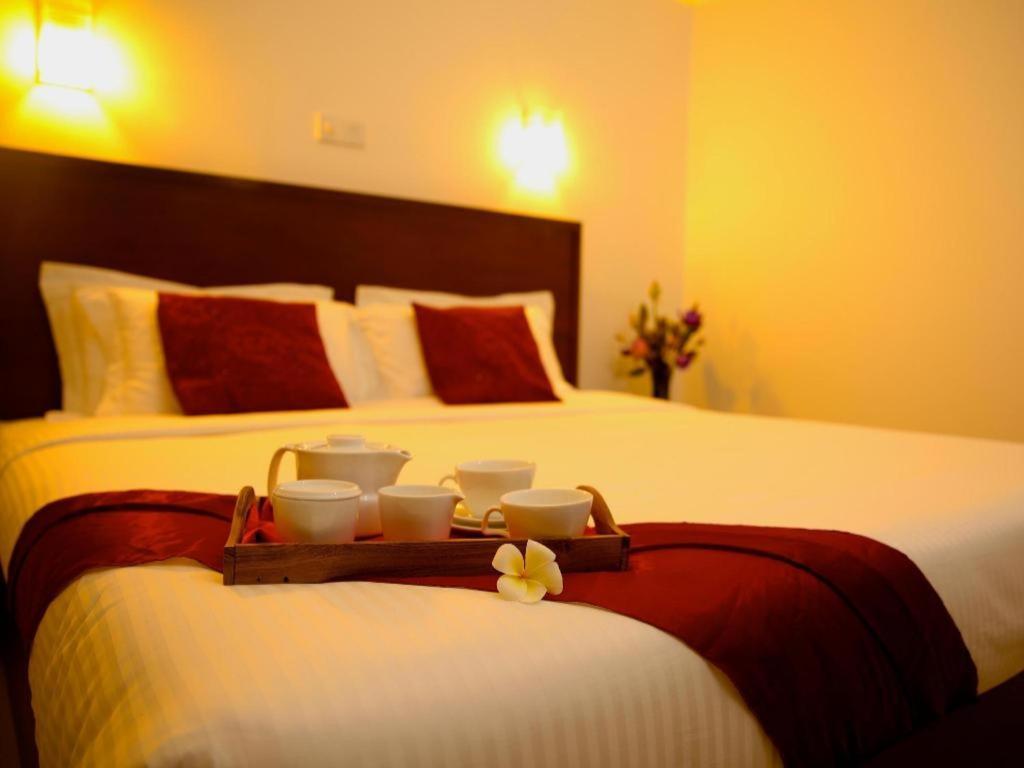 วิสเปอริ่ง ปาล์ม โฮเต็ล Hotel เบนโตตา ภายนอก รูปภาพ