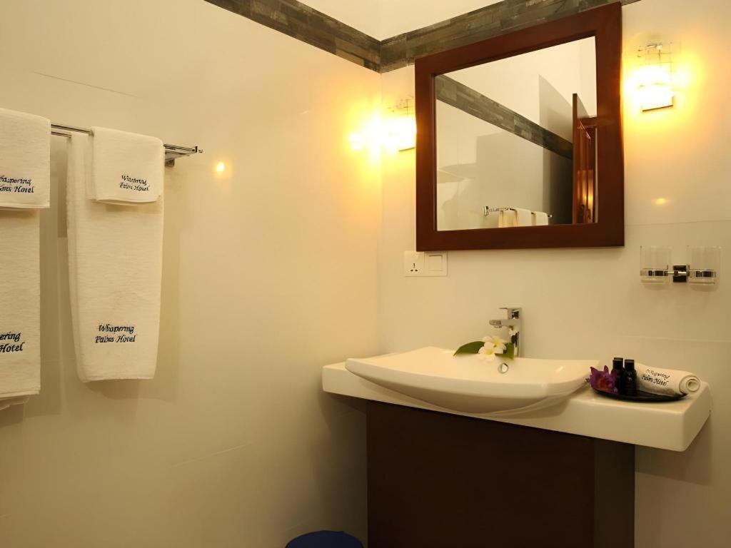 วิสเปอริ่ง ปาล์ม โฮเต็ล Hotel เบนโตตา ภายนอก รูปภาพ