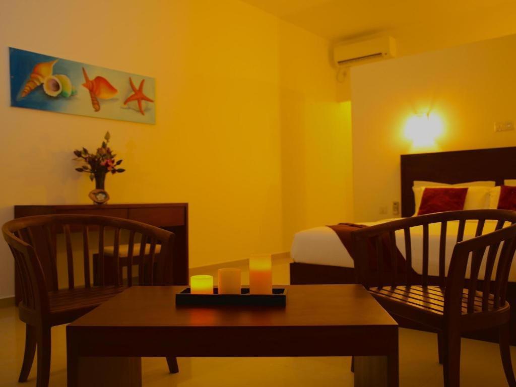 วิสเปอริ่ง ปาล์ม โฮเต็ล Hotel เบนโตตา ภายนอก รูปภาพ