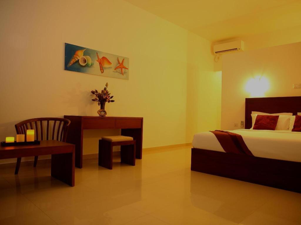 วิสเปอริ่ง ปาล์ม โฮเต็ล Hotel เบนโตตา ภายนอก รูปภาพ